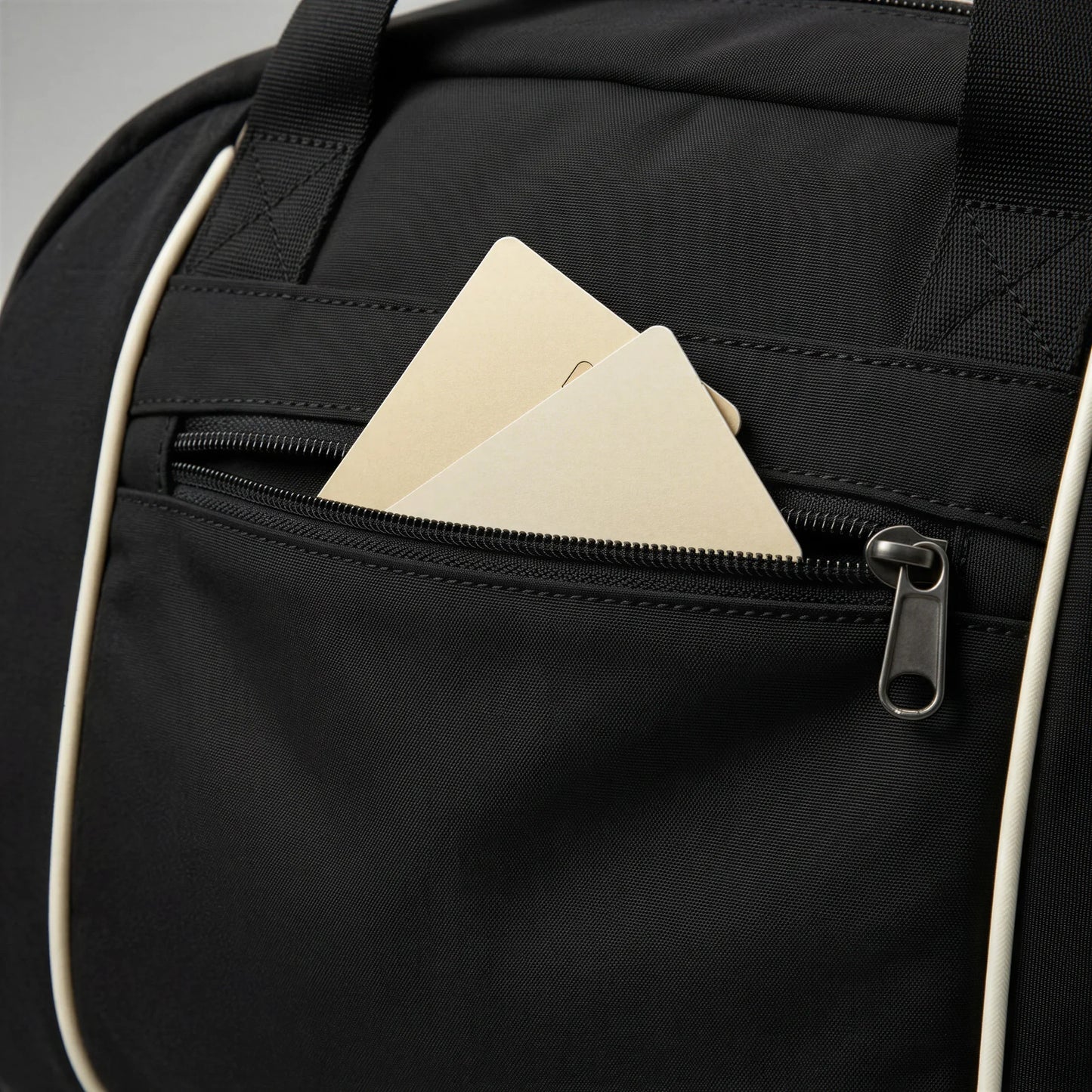 CourtDuet Bag in Court Black hidden back zip pocket detail